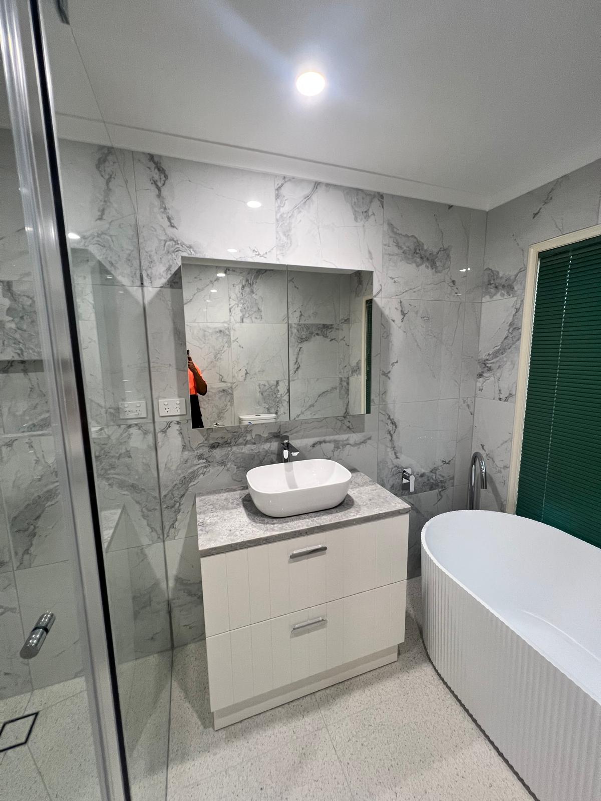 Vanity and freestanding tub
